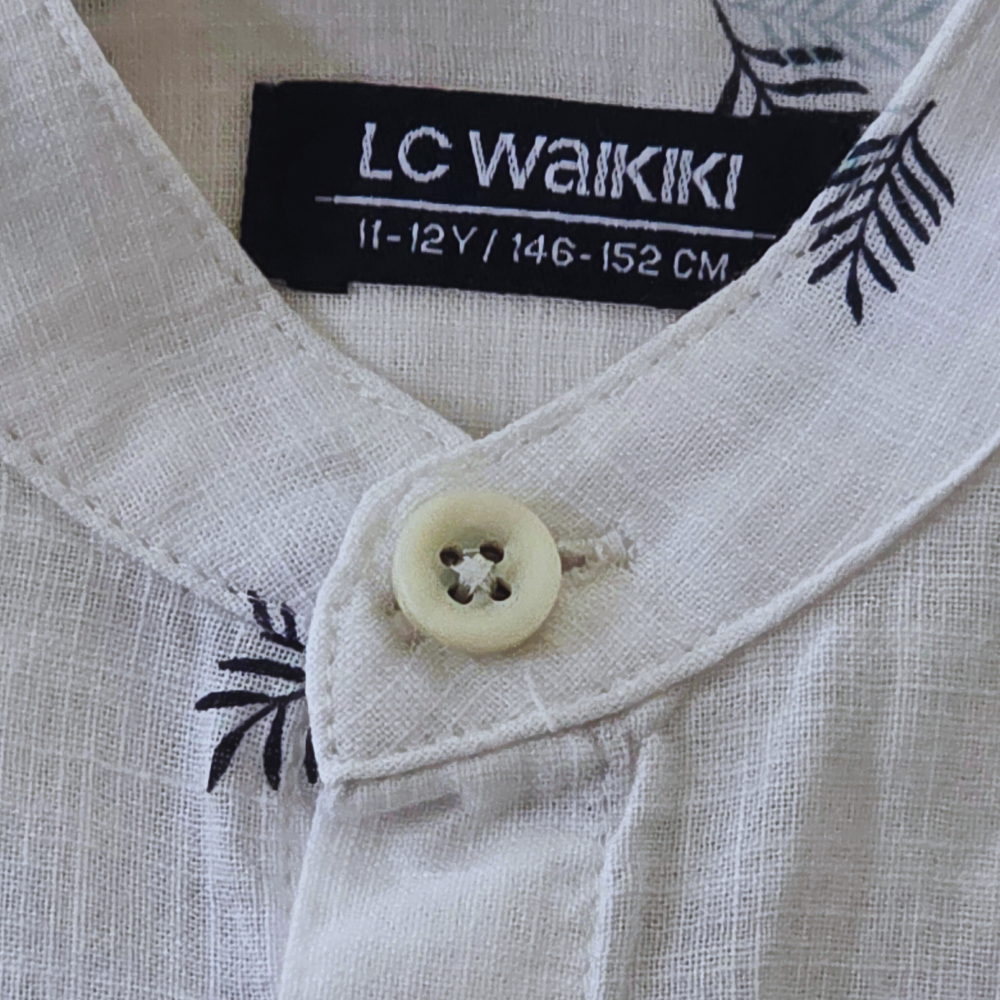 B - Chemise manches courtes 11-12 ans # 79