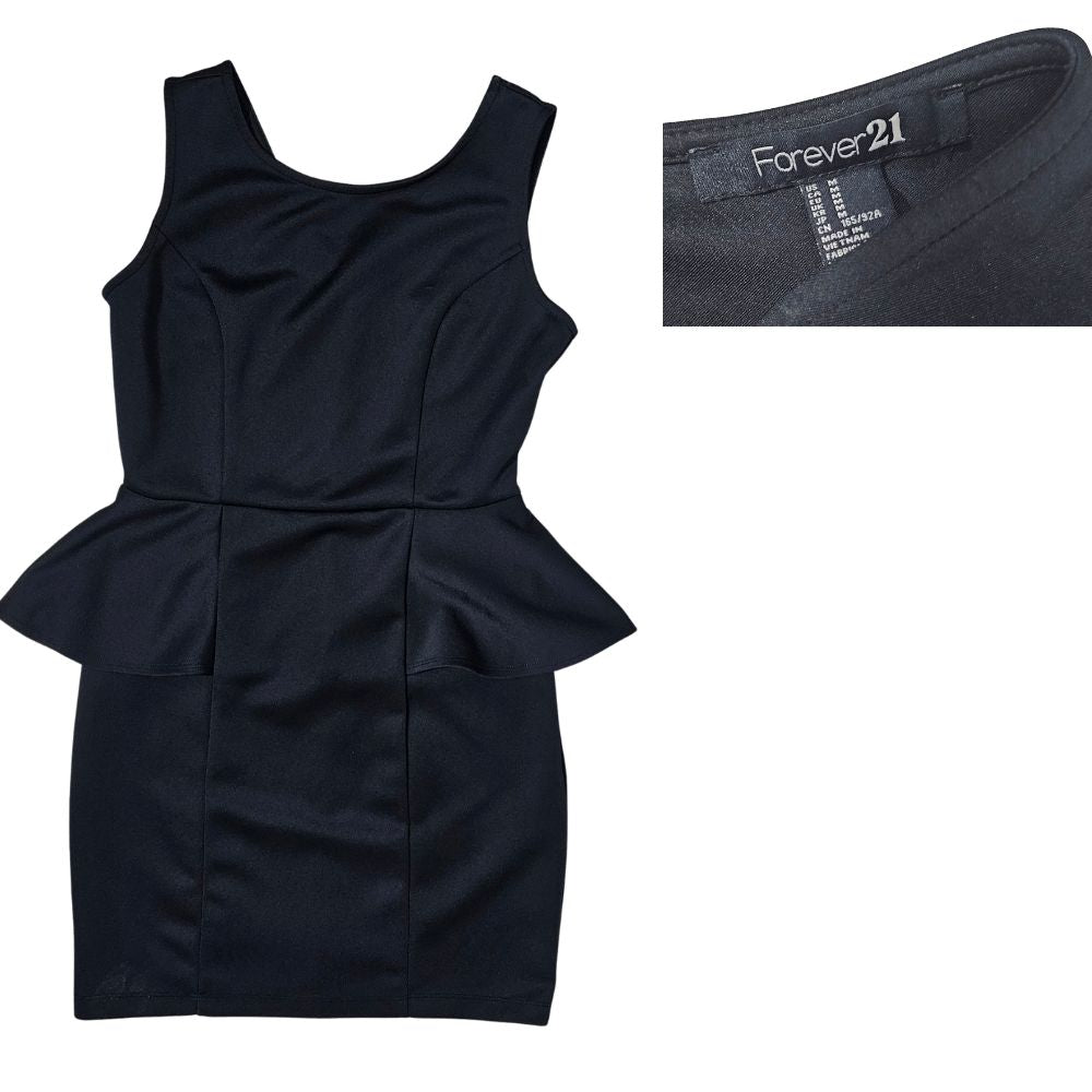 Elégante robe noire sans manches avec une coupe peplum à la taille 38 #569