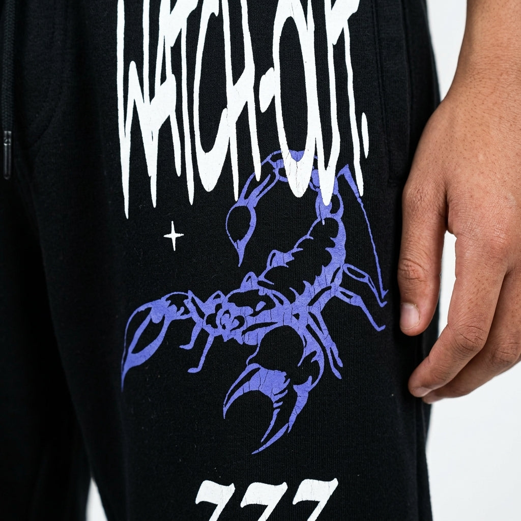 Jogging pants — Graffiti Print Detail | Generated by Modelize