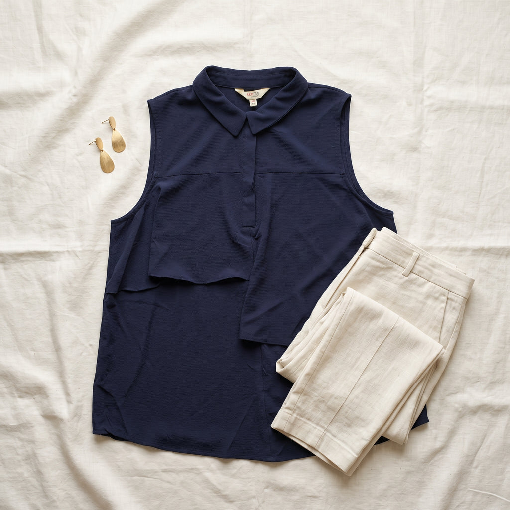 Sleeveless blouse — Styled Outfit Flat Lay | Generated by Modelize