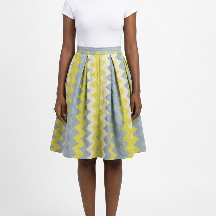 Pleated flared skirt — Full length on model | Generated by Modelize